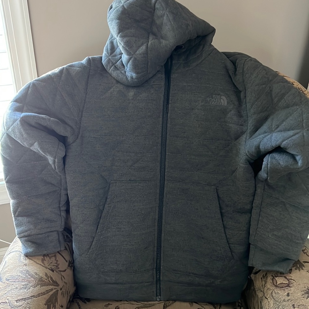 The North Face reversible coat. Gray quilt on one side and gray camo on reverse.